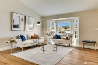 A vaulted ceiling in the living space and the open layout make the house feel even bigger than it is.