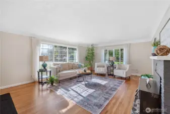 Light shining in from front picture window and side window with Blinds