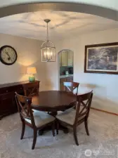 Dining area off entry and kitchen.