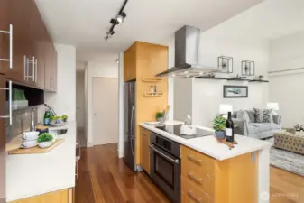 Looking down the hall to the left, you'll find the front door.  Down the hall to the right you'll head to the bedrooms.