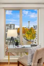 Who doesn't want to work or study from here?!  Second bedroom, the Space Needle and bountiful trees and views of nature perfectly framed by the window!