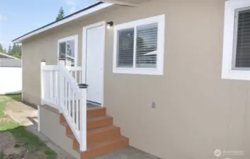 A second private entry leads into the cozy reading area-your peaceful escape just steps away
