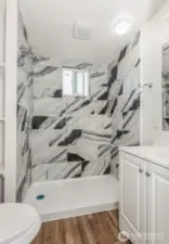 A second bathroom with shower, providing added convenience for guest and household members.