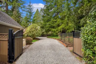 Back gate entrance to arena, stalls, RV & trailer parking as well as hay storage. Easy hauling.