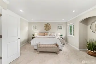 Spacious primary suite easily accommodates a king-size bed