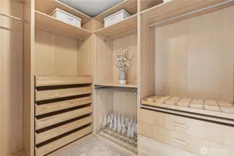 Custom closet organizers in the primary closet