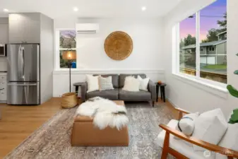 Light-filled interiors. Home sits off the street and has a private feel.