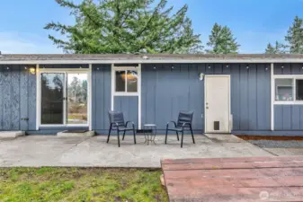 Backyard patio with access to to garage