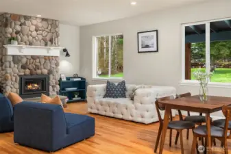 A warm and inviting living room featuring a brand-new fireplace.