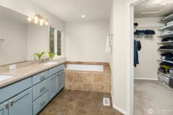 Primary bath with spacious walk-in closet.