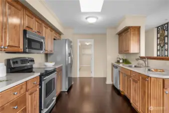 Chef's preferred kitchen style is this spacious galley, lots of space for company and help for the chef.