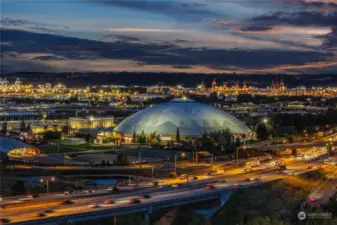 Watch Port and Dome activity and the twinkling lights of Down Town Tacoma through multiple windows.