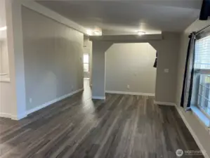 Living room looking towards entry - unfurnished