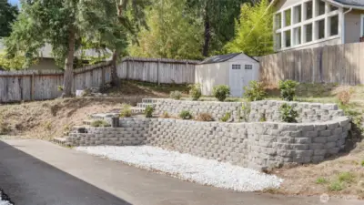 tiered back yard area with shed