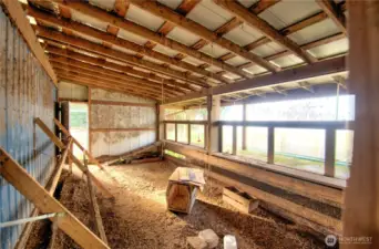 chicken coop off side of shop. Door leads to outdoor run.