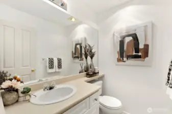 Main bath is to right of garage entry as you come in.