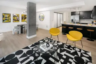 Looking toward the dining room to the left and kitchen to the right.  Notice the beautiful new Mohawk Sea Voyage laminate flooring.  Open floor plan for flexible living arrangements.