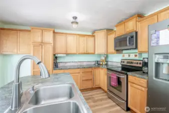 Plenty Of Cabinet Space And Island With Sink/ Dishwasher