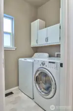 Laundry Room with built in storage on back wall