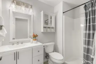 Main level 3/4 bath sits next door to office.