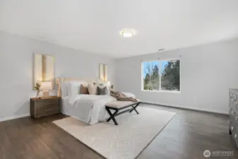 Over-sized primary suite sits on upper level.