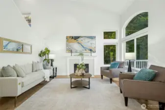 Cozy fireplace with comfortable seating area.