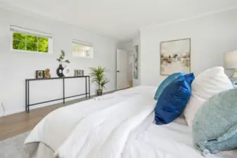Cozy bedroom with ample natural light.