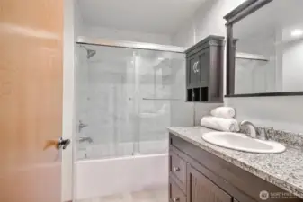 Full bath w/ new tub, new tile wall, new floor and new toilet