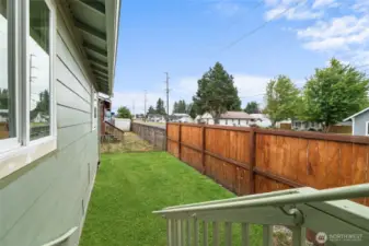 This is your view to the left of the deck. Grass has been photo edited to show what it looks like most months out of the year.