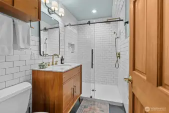 Main floor 3/4 bath directly adjacent to the main floor "flex space."