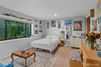 2 BEDROOM APARTMENT lower level Suite with a walk-in closet and private bathroom.