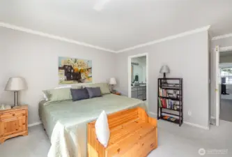 Primary bedroom boasts double door entry and private en-suite bathroom.