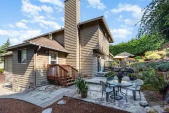 Step outside onto your outdoor oasis lined with established trees.