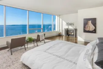 Primary suite is gracious with ensuite spa bathroom, large walk-in closet and fireplace.