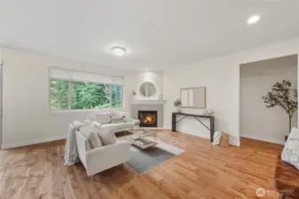 The floorplan is open and inviting featuring a gas fireplace.