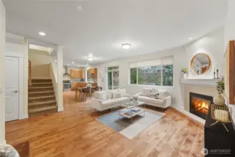 The large main floor living, dining and kitchen area.