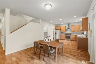 Plenty of room for a dining table between the kitchen and living area.