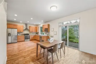 The main floor looks out to the patio, low maintenance backyard and greenbelt.