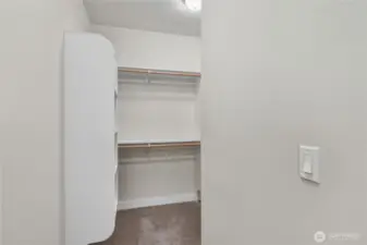 A large walk in closet complements the primary bedroom.