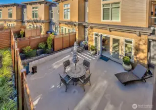 Huge south facing, sun filled patio provides space for gardening, relaxing or dining outdoors on warm evenings.