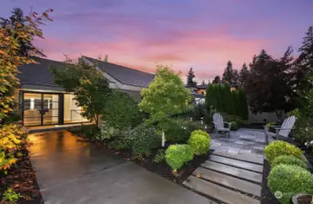 Phenomenal landscaping creates private outdoor rooms and utilizes the lot.