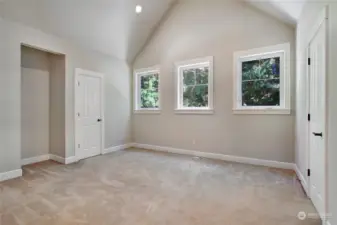 Bonus room with vaulted ceilings and two large storage spaces in both closets.