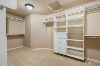 Primary Walk-In Closet with smart built-ins.