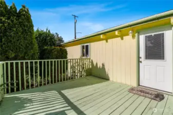 Enjoy a BBQ on the back porch! This deck is freshly painted.