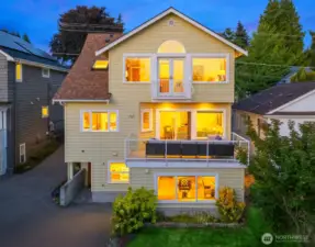 Step into the golden hour. Striking multi-level home in Ravenna with gallery-like views.