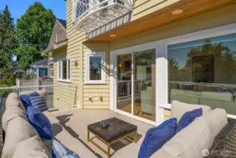 Gather your favorite people or lounge alone on the roomy deck off family room.