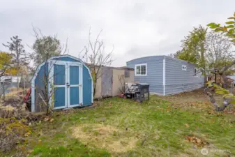 Large lot with storage sheds