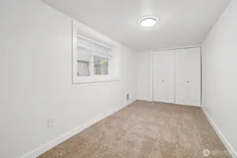 second bedroom—ideal for guests or office space.