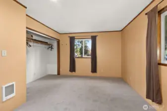 Private primary suite offering a comfortable retreat at the end of the day. New carpet just installed and all the finishing touches are being completed.