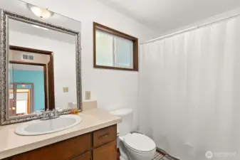 Full main bath bath serving additional bedrooms and guests.